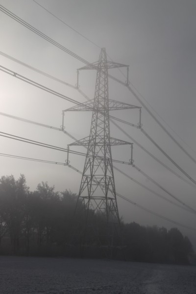 electricity-pylon-merging-out-of-the-haw-frost-mist